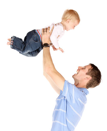 Happy caucasian dad holding his baby boy. Image is isolated on a white background.の写真素材