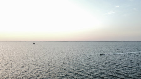 Sunset on the sea, view from the sea to the horizon