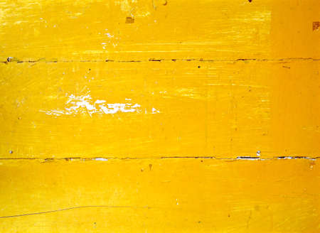 Yellow wooden house wall texture for backgroundの写真素材