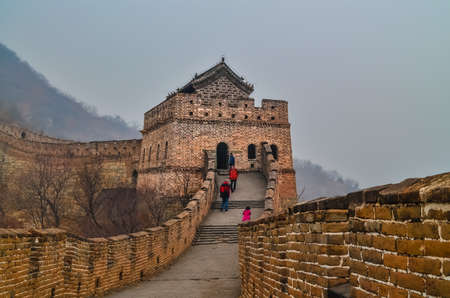 Foggy view in winter weather at The Great Wall "Mutianyu" in Beijing, China.のeditorial素材