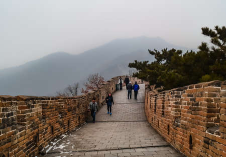 Foggy view in winter weather at The Great Wall "Mutianyu" in Beijing, China.のeditorial素材