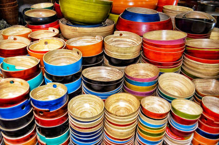 Wood bowl in handicraft shop at local market name "Toul Tum Poung Market or Russian market, famous place for shopping for foreigner and local people at Phnom Penh, Cambodiaの写真素材