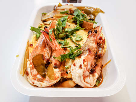 Creamy Omelet with Tomyum Kung suace  on Riceの写真素材