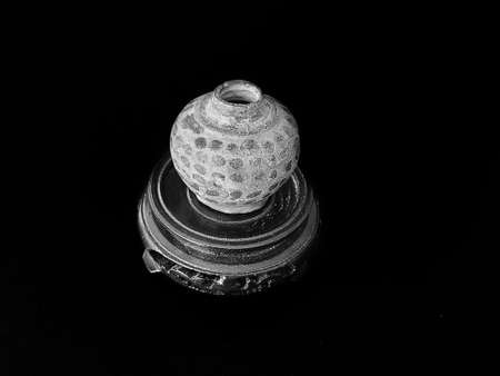 Silver object on a black background. Silver object on a black background.の写真素材