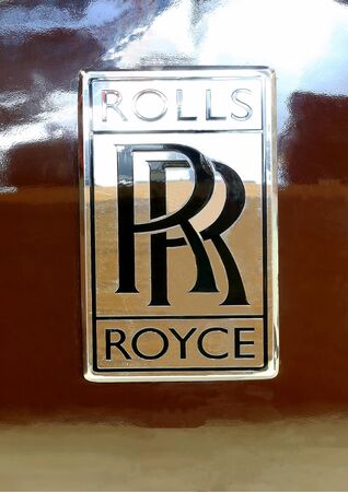 Bangkok - April 2 :logo of Rolls Royce on brown car - in display at The 36th Bangkok international...