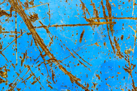 abstract background of rust on blue metal