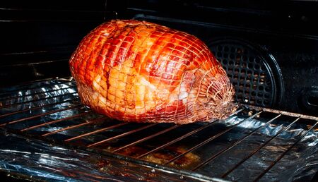 Fillet of pork in the oven close upの写真素材