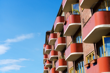 Building architecture with balconies on blue background Oslo, Norwayの写真素材