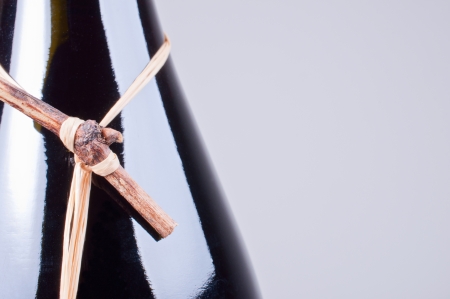 Full wine bottle on grey background close upの写真素材