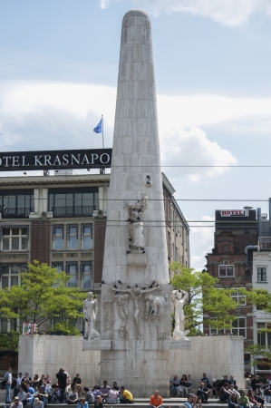 AMSTERDAM - JUNE 10: Dam monument on June 10, 2011. The white stone pillar is a National Monument, designed by J.J.P. Oud and erected in 1956 to memorialize the victims of the World War II.のeditorial素材