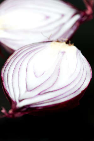 Fresh cutted red onion close upの写真素材