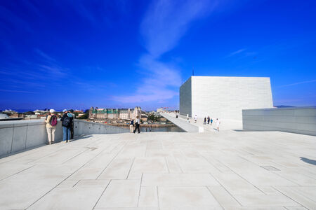 OSLO, NORWAY - AUGUST 11: National Oslo Opera House shines at sunrise on August 11, 2012. Oslo Opera House was opened on April 12, 2008 in Oslo, Norwayのeditorial素材