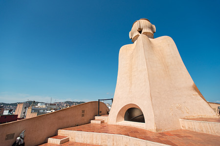 BARCELONA - JULY 19. Gaudi Chimneys at Casa Mila (also called La Pedrera) on July 19, 2012 in Barcelona. Terrace of the Casa Mila, with chimneys shaped anthropomorphic soldiers, created by Gaudi.のeditorial素材