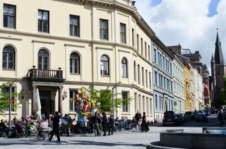 OSLO, NORWAY - MAY 17: Unidentified people having lunch in the cafe on 17 May 2012 in Oslo. It's constitution day in Norwayのeditorial素材