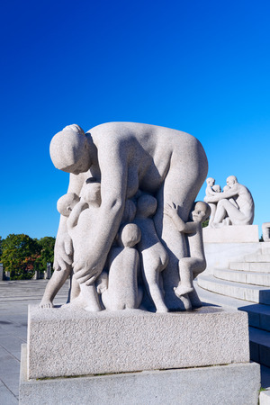 OSLO, NORWAY- AUGUST 7: Statues in Vigeland park in Oslo, Norway on August 7, 2012. The park covers 80 acres and features 212 bronze and granite sculptures created by Gustav Vigelandのeditorial素材