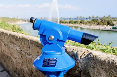 Tourist viewing telescope at landmark in Spainの写真素材