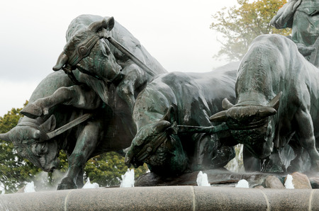 COPENHAGEN, DENMARK - AUGUST 23: The Gefion Fountain (Danish: Gefionspringvandet) is a large fountain on the harbour front in Copenhagen, Denmark in August 23, 2012. The fountain was first activated on July 14, 1908のeditorial素材