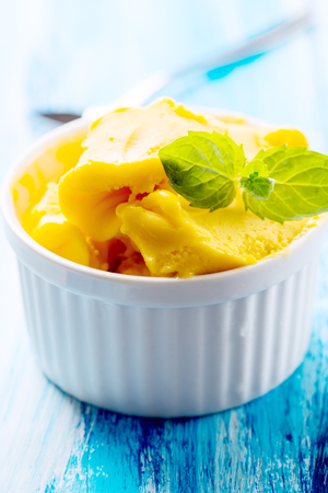 Passion fruit sherbet with mint leavesの写真素材