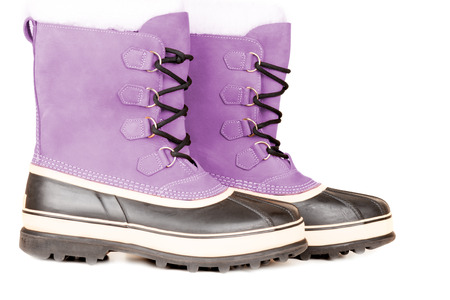 Pink winter shoes isolated on white backgroundの写真素材