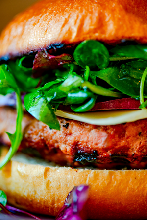 Homemade cheese burger on a plateの写真素材