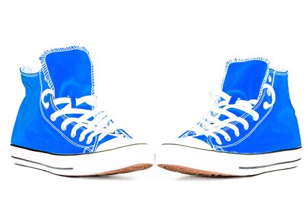 Pair of sports shoes isolated on white backgroundの写真素材