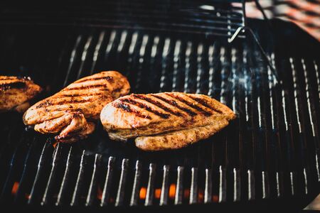 Chicken filet on barbeque grillの写真素材