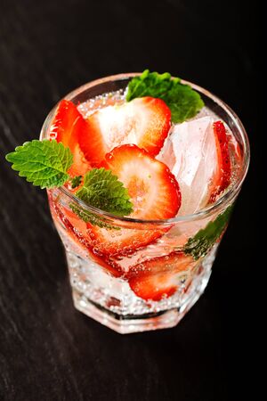 Fresh strawberry drink on dark backgroundの写真素材