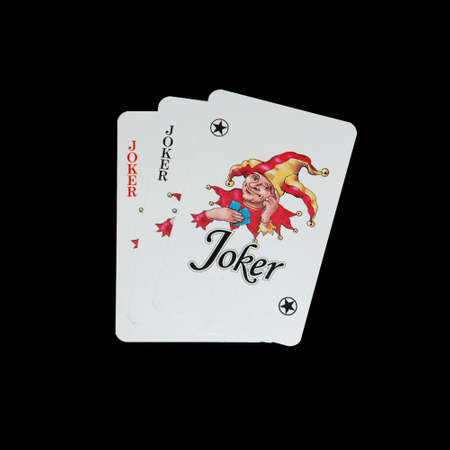 playing cards isolated on black background. jokerのeditorial素材