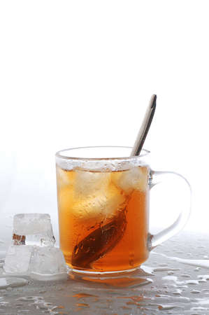 cold tea and ice cubesの写真素材