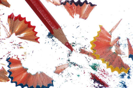 one red pencil and  chips on whiteの写真素材