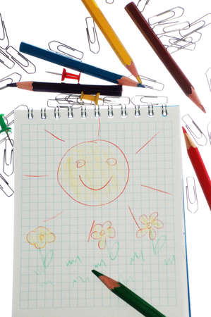 notepad, colour pencils, staple, children's drawing の写真素材