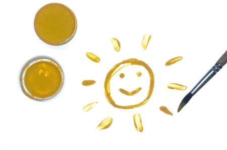 paintbox, brush and children's drawing on whiteの写真素材