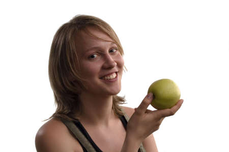 happy girl with apple in handの写真素材
