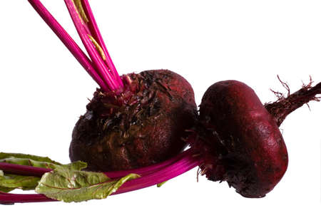 two red beets on white