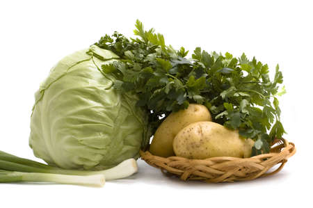 raw summer vegetable in basket on whiteの写真素材