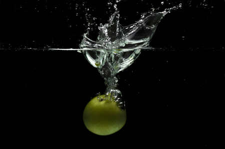 Splashing Appleの写真素材
