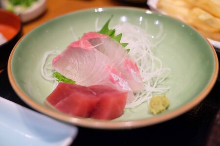 Blurred soft of fresh raw bluefin tuna sashimi fillet on plate- Japanese food style.の写真素材