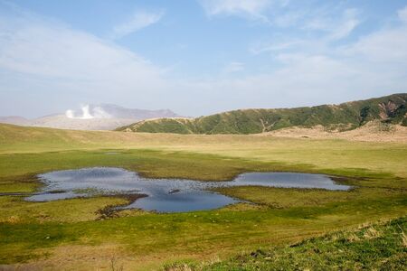 Landcape Aso volcano mountain and farmer village in Kumamoto, Japan.の写真素材