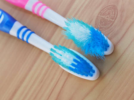 Comparison of the old and new toothbrushes showing different bristle conditions: time to change a...