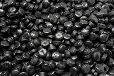 Black Plastic pellets. Colorant for plastics.の写真素材