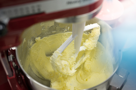 There are mix butter and eggs to prepare to make bread and cookies.の写真素材
