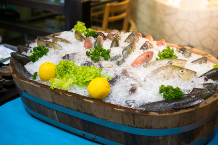 fresh fish with ice on tank, for sashimi at the japanese restaurant.の写真素材