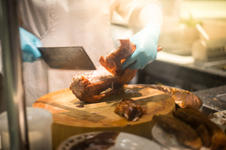 Chef is preparing roasted duck in Chinese restaurantの写真素材