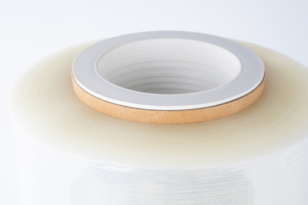 The plastic roll for wrap and seal food in the factory.の写真素材