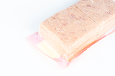 ham in plastic pack in white background.の写真素材