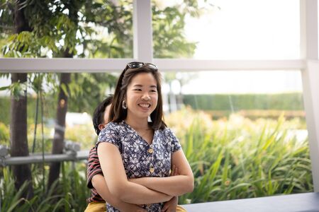 Mother and son are playing together in the living room.の写真素材