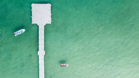 Sea aerial view, The color of the water and beautifully bright. The beach with rocky mountains and clear water of Thailand ocean on a sunny day. Landscape background.の写真素材
