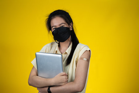 A working woman received vaccinesの写真素材