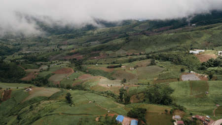 In the fog and clouds, a panoramic view of the Thai mountains.の写真素材