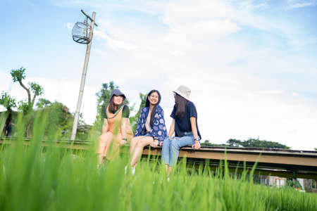 Travelers in a rice field. Traveling to clean locations on the planet and discovering nature's splendor.の写真素材